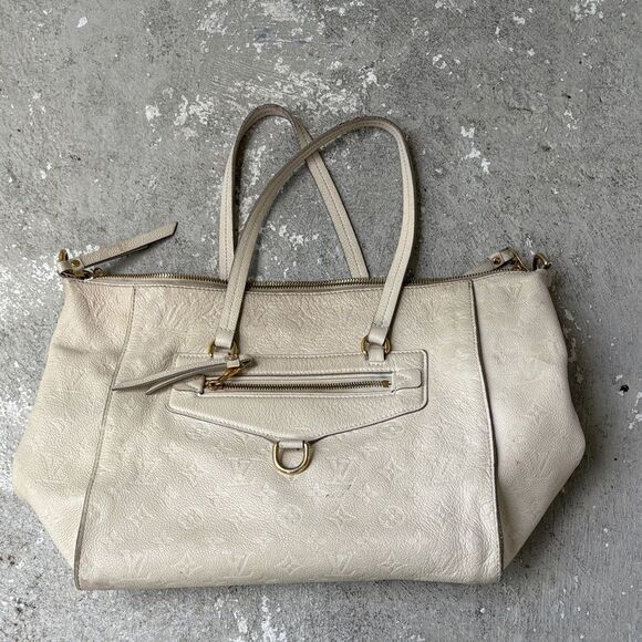 Louis Vuitton Handbags - Louis Vuitton leather tote